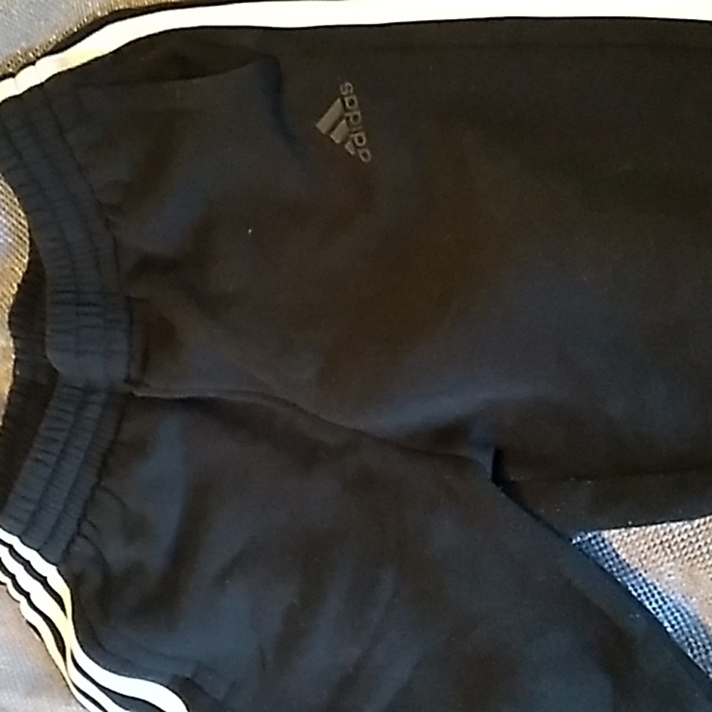 Adidas kids sz 14 black sweatpants with white stripes down the sides